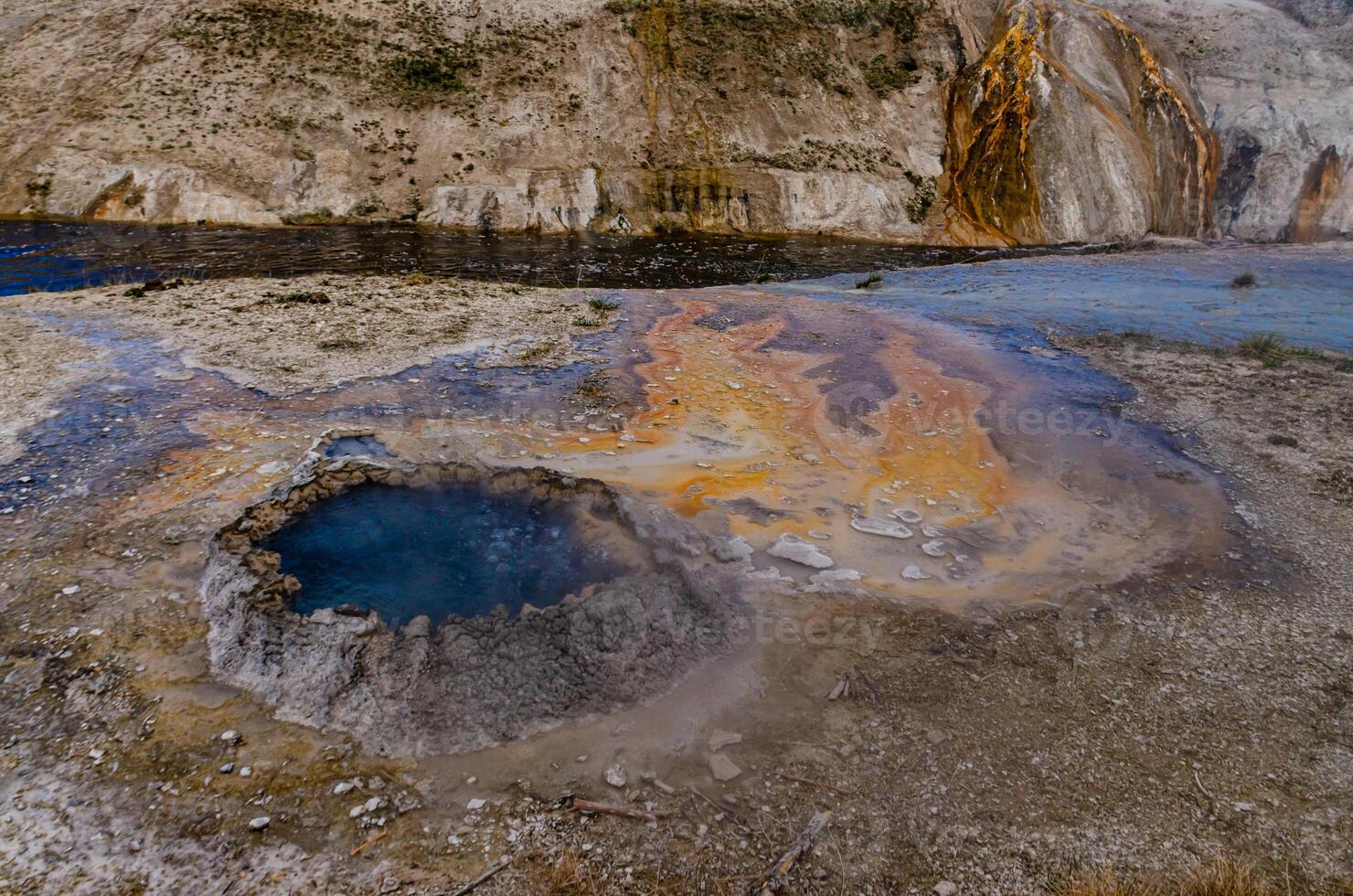 Boiling water bubbler Geyser. Active geyser with major eruptions. Yellowstone NP, Wyoming, US photo
