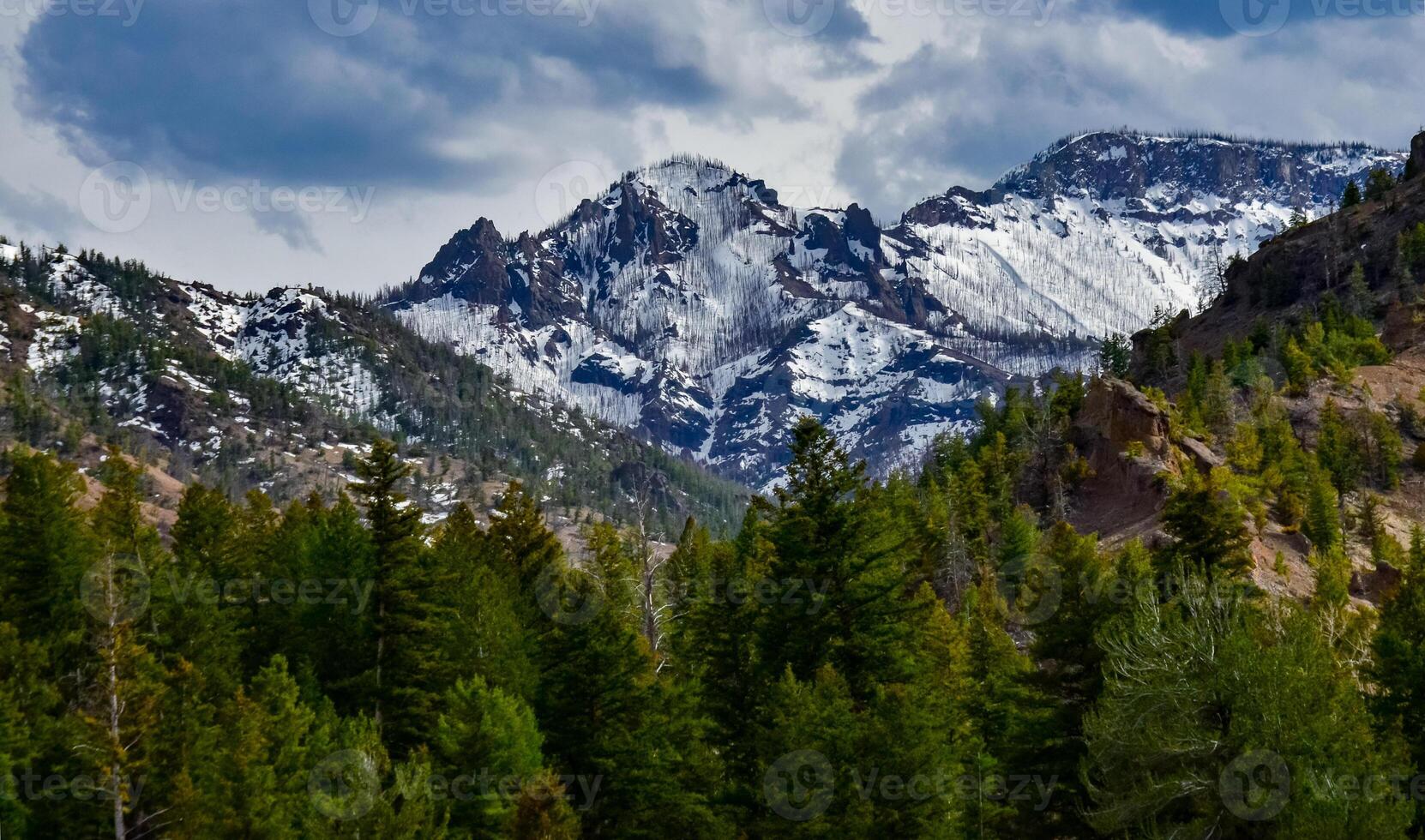 Mountain landscape, snow in the mountains in spring in Montana photo