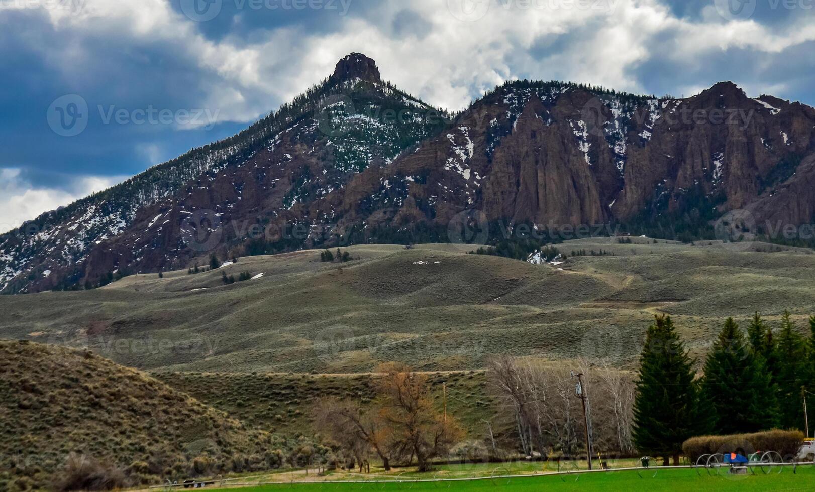 Mountain landscape, snow in the mountains in spring in Montana photo