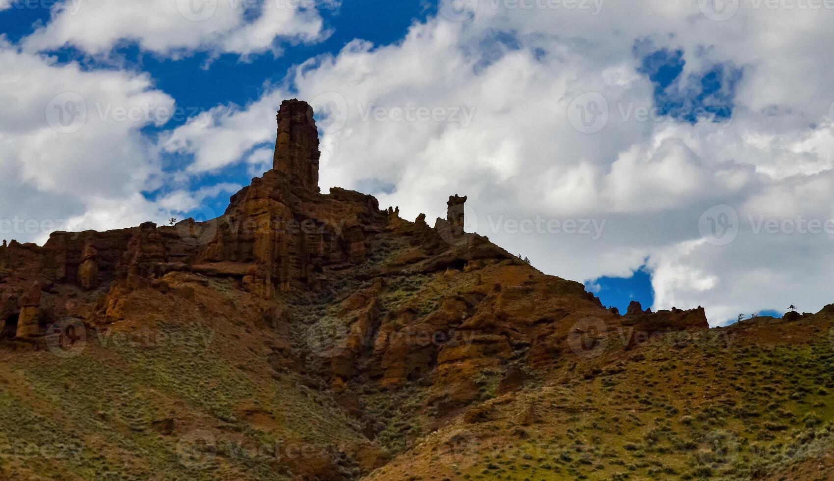 Nature Montana. Mountain landscape, red rocks against the backdrop of a cloudy sky in Montana, USA photo