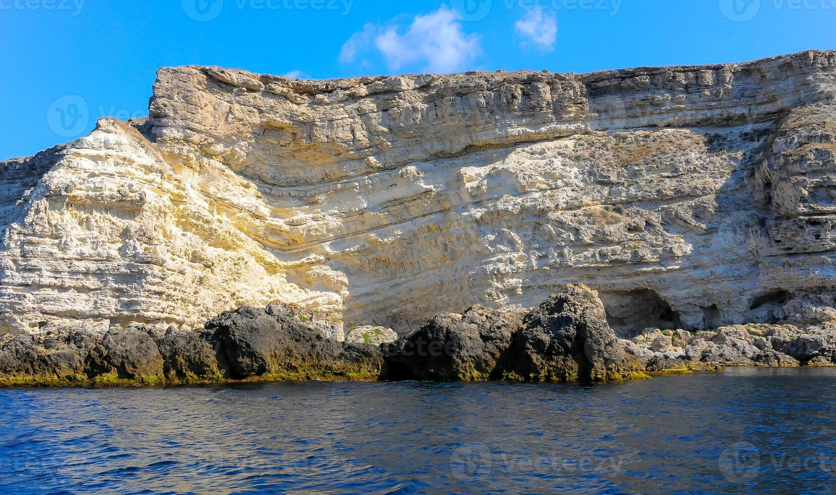 High Coastal cliffs from layered Pontic limestone in the western Crimea, Tarkhankut photo