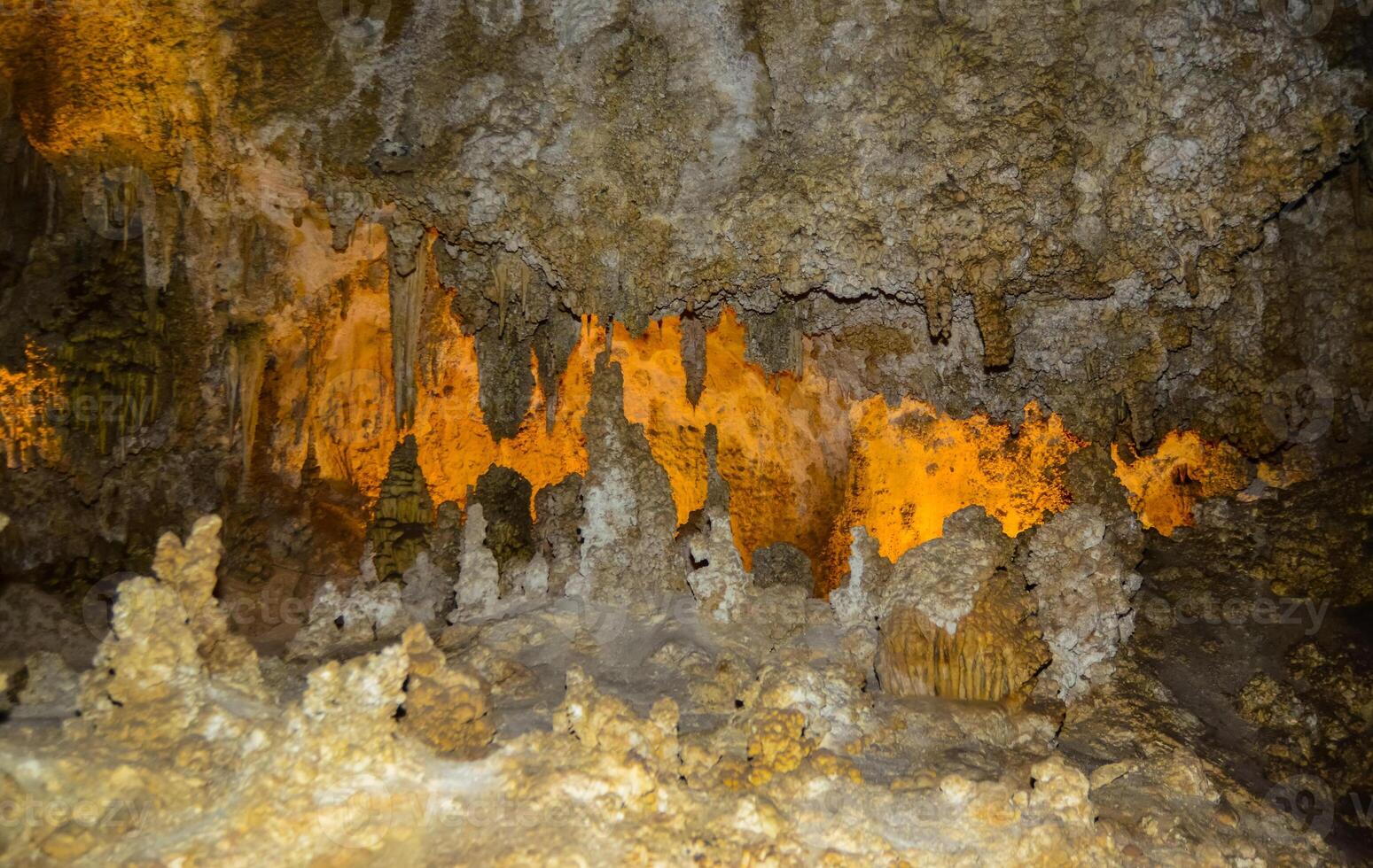 Calcite inlets, stalactites and stalagmites in large underground halls in Carlsbad Caverns National Park, New Mexico. USA photo