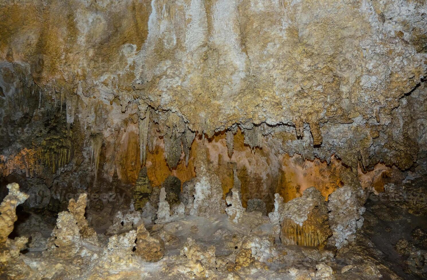 Calcite inlets, stalactites and stalagmites in large underground halls in Carlsbad Caverns National Park, New Mexico. USA photo