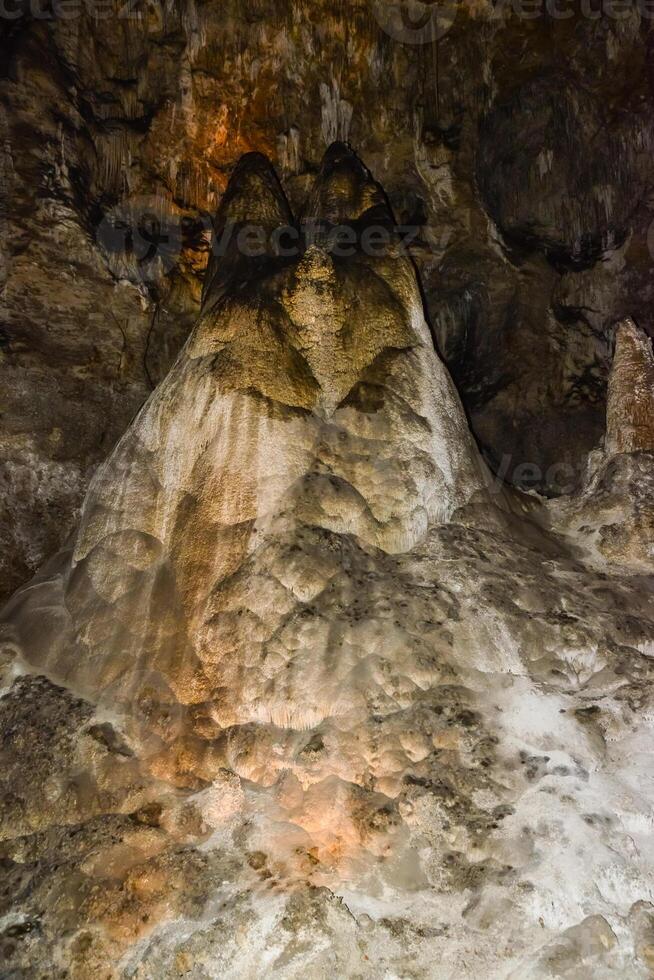 Calcite inlets, stalactites and stalagmites in large underground halls in Carlsbad Caverns National Park, New Mexico. USA photo