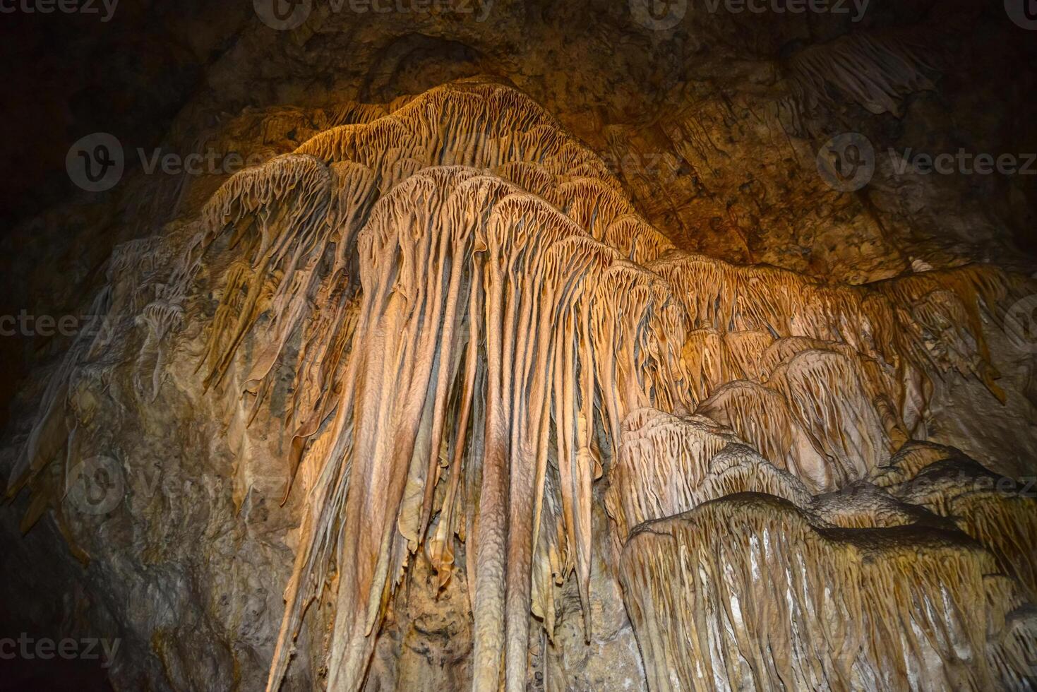 Calcite inlets, stalactites and stalagmites in large underground halls in Carlsbad Caverns National Park, New Mexico. USA photo