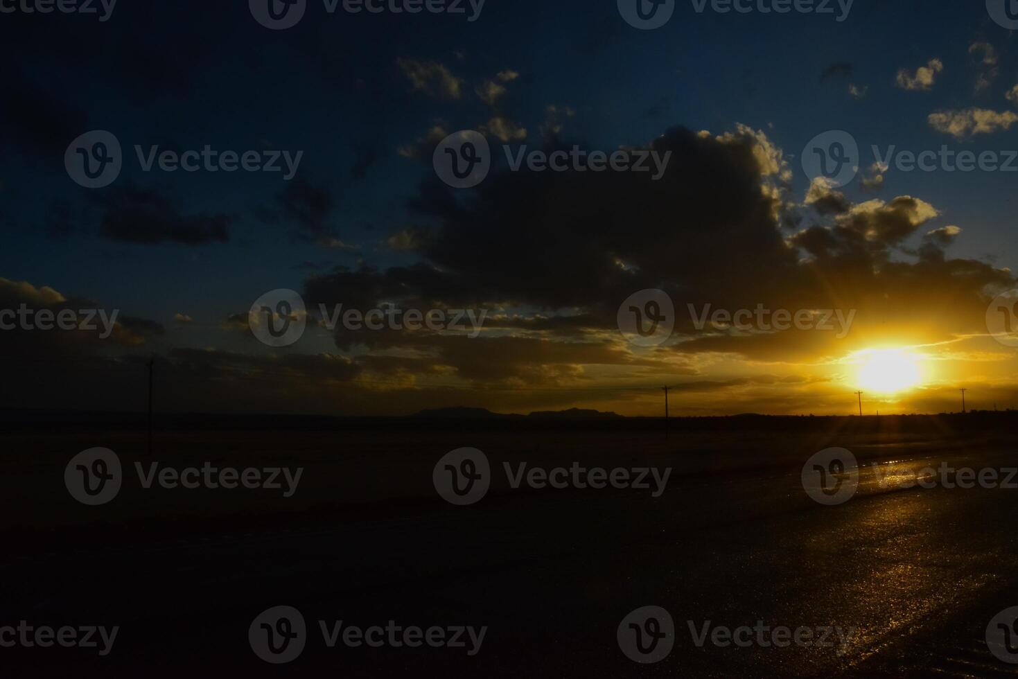 Big cumulus clouds in the evening during sunset in New Mexico photo