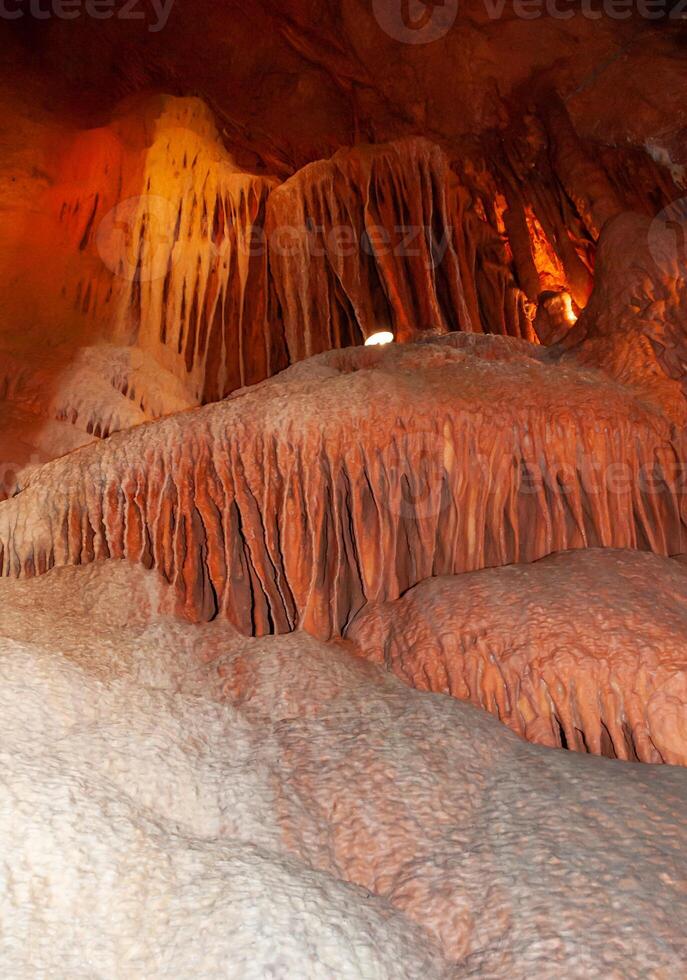 Calcite inlets, stalactites and stalagmites in large underground halls in Carlsbad Caverns NP, New Mexico photo