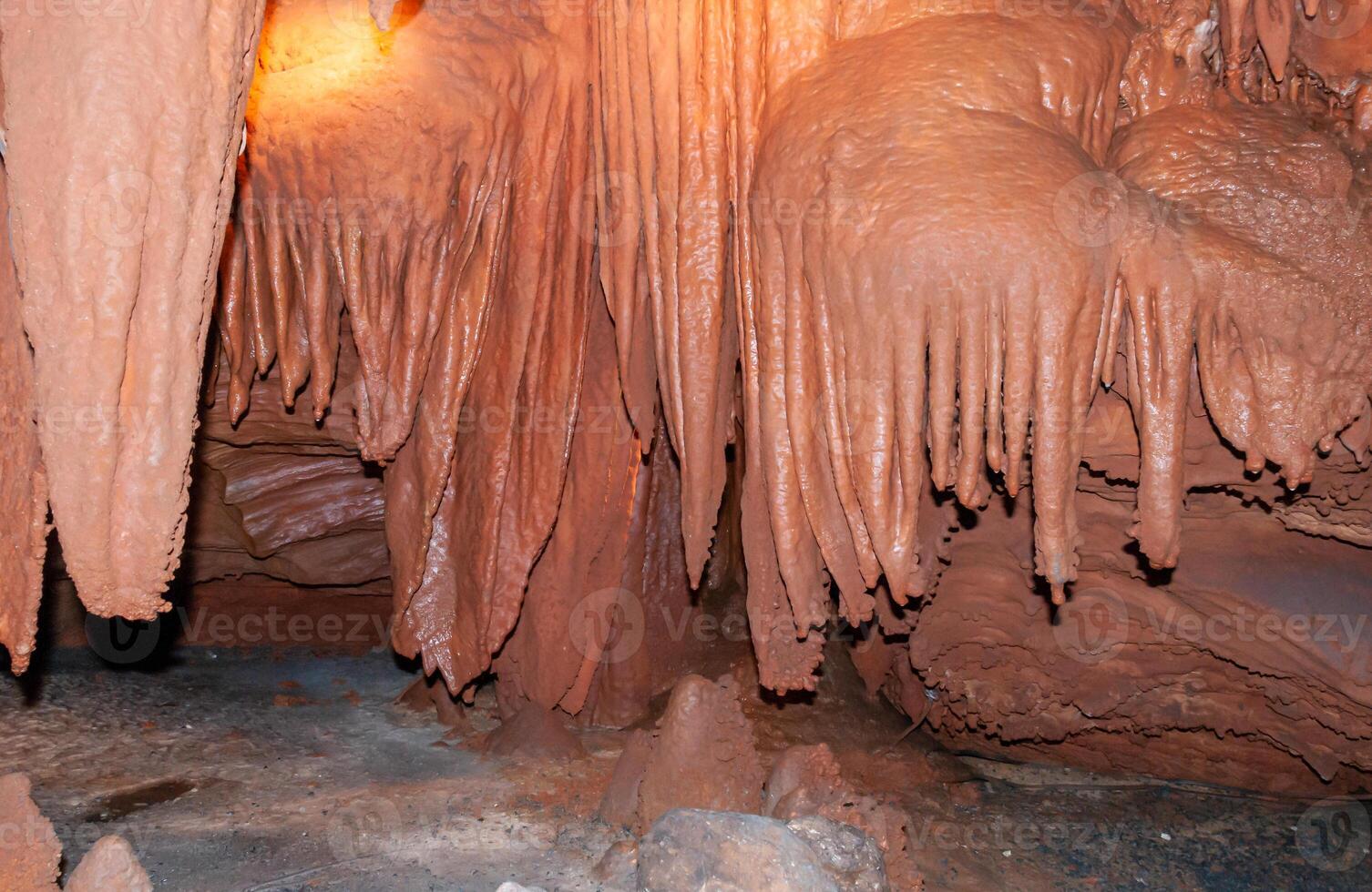 Calcite inlets, stalactites and stalagmites in large underground halls in Carlsbad Caverns NP, New Mexico photo
