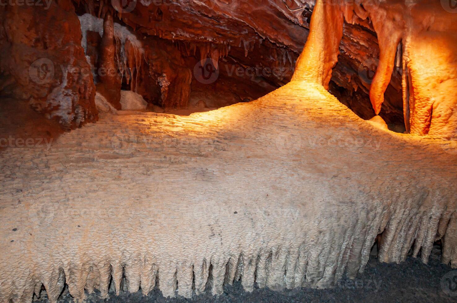 Calcite inlets, stalactites and stalagmites in large underground halls in Carlsbad Caverns NP, New Mexico photo