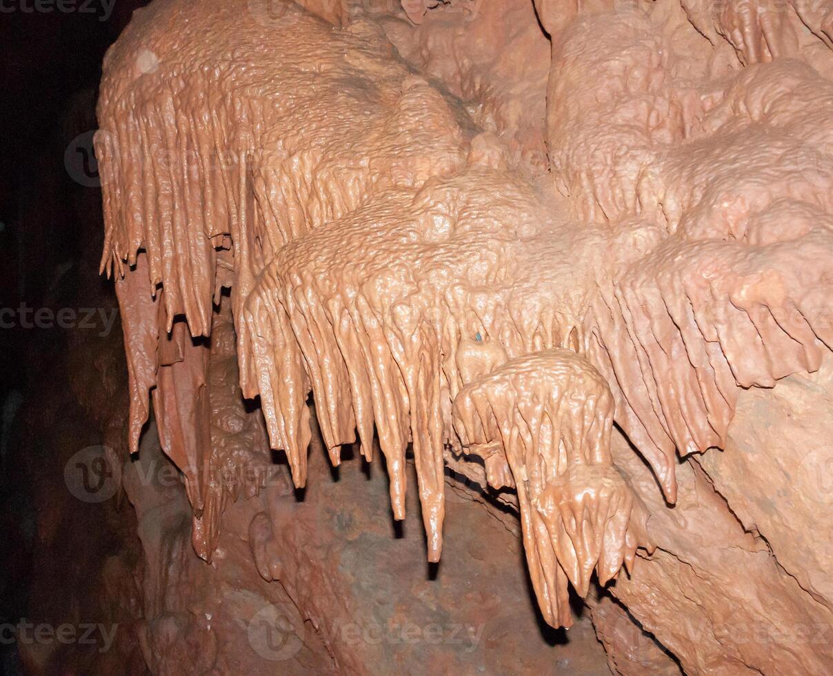 Calcite inlets, stalactites and stalagmites in large underground halls in Carlsbad Caverns NP, New Mexico photo