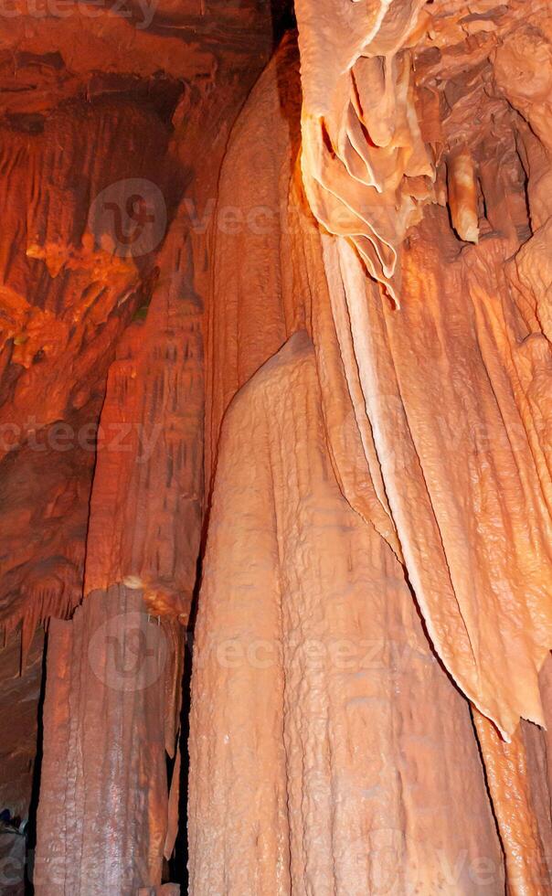 Calcite inlets, stalactites and stalagmites in large underground halls in Carlsbad Caverns NP, New Mexico photo
