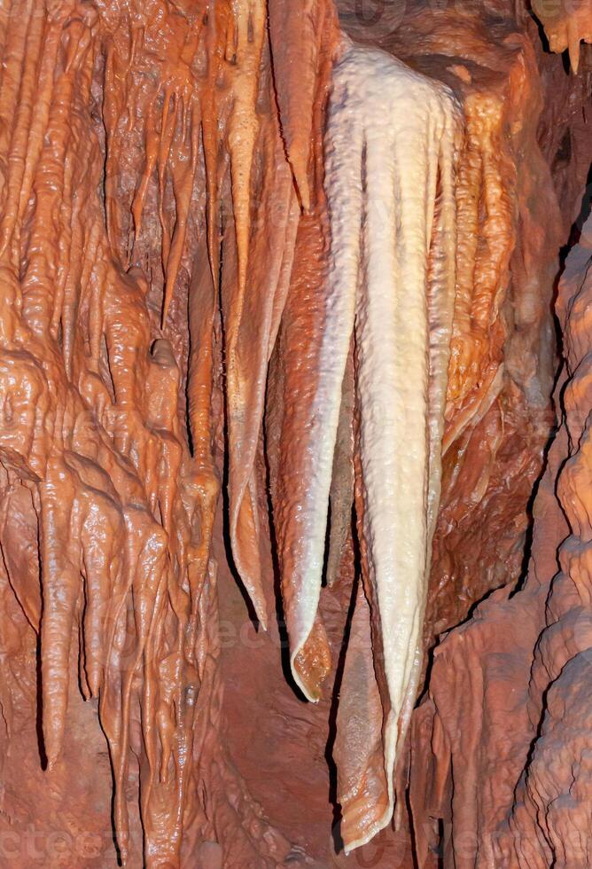 Calcite inlets, stalactites and stalagmites in large underground halls in Carlsbad Caverns NP, New Mexico photo