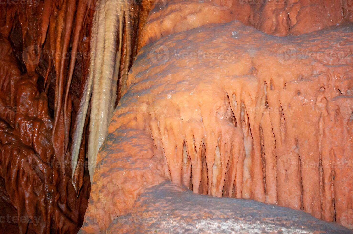Calcite inlets, stalactites and stalagmites in large underground halls in Carlsbad Caverns NP, New Mexico photo