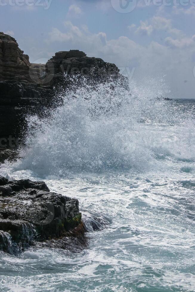 Severe storm at sea near the coastal cliffs in the Black Sea on Tarkhankut, Atlesh, western Crimea photo