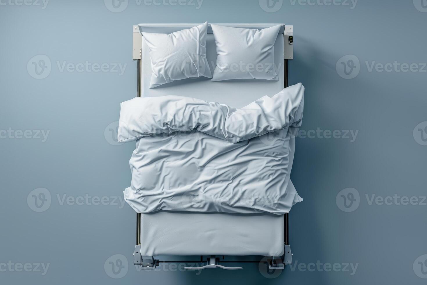 Cozy, rumpled bed with fresh white linens in a softly illuminated room during a tranquil morning photo