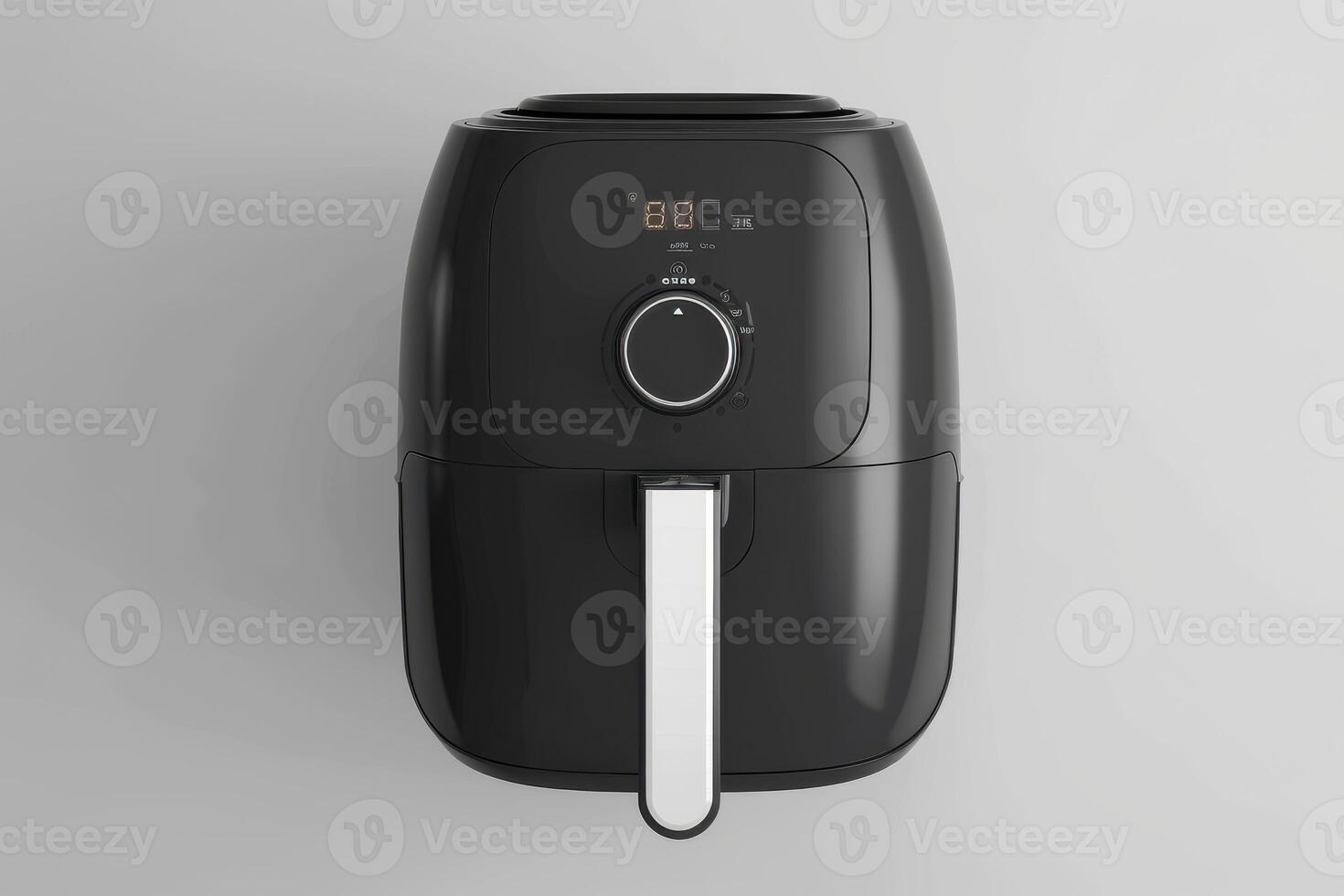 Modern air fryer on a minimalistic countertop illuminating its digital display and sleek design photo