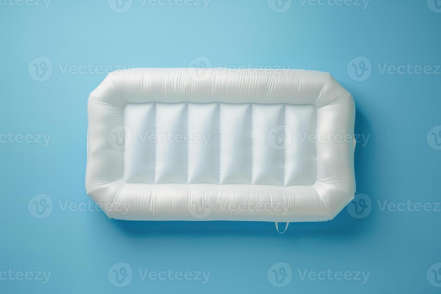 An inflatable float in a serene blue setting, perfect for summer fun at the pool or beach photo