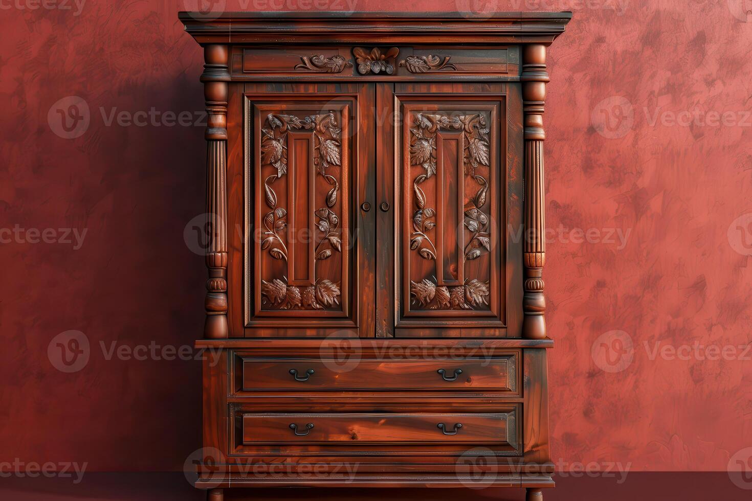 Elegant wooden cabinet with intricate carvings against a warm red wall photo