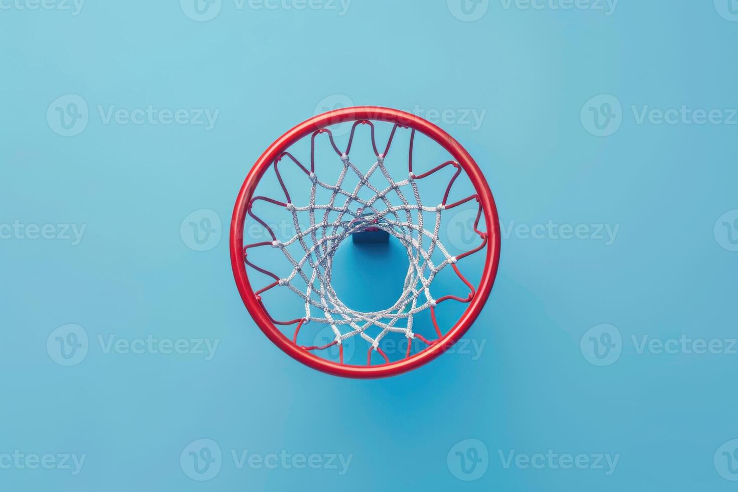 A vibrant basketball hoop against a bright blue backdrop captures the essence of the game, inviting players to take their best shot photo
