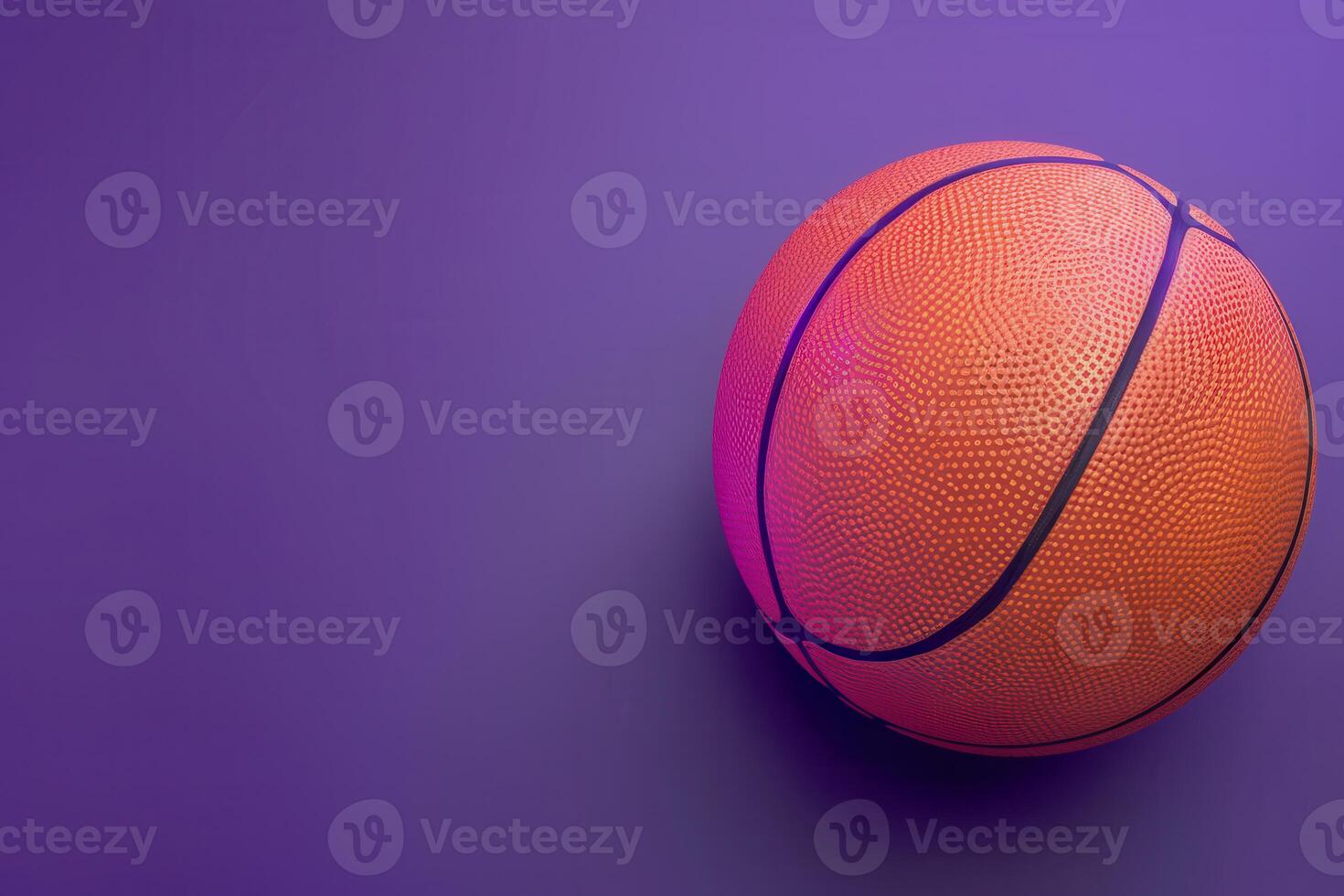 A vibrant orange basketball resting on a purple backdrop, radiating energy in a playful and dynamic composition photo