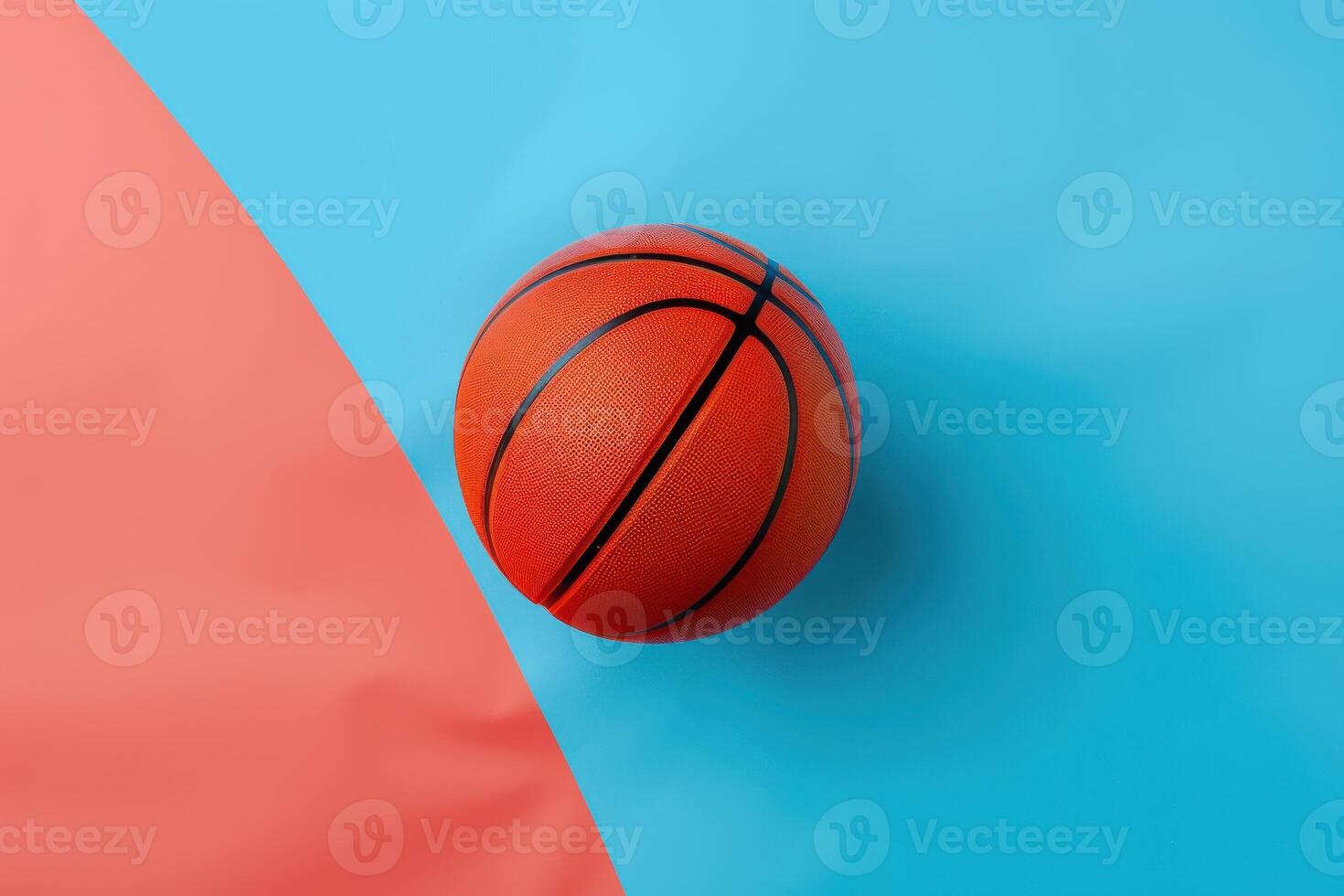 Dynamic basketball resting on a colorful background with vibrant blue and coral hues, capturing the energy of the game photo