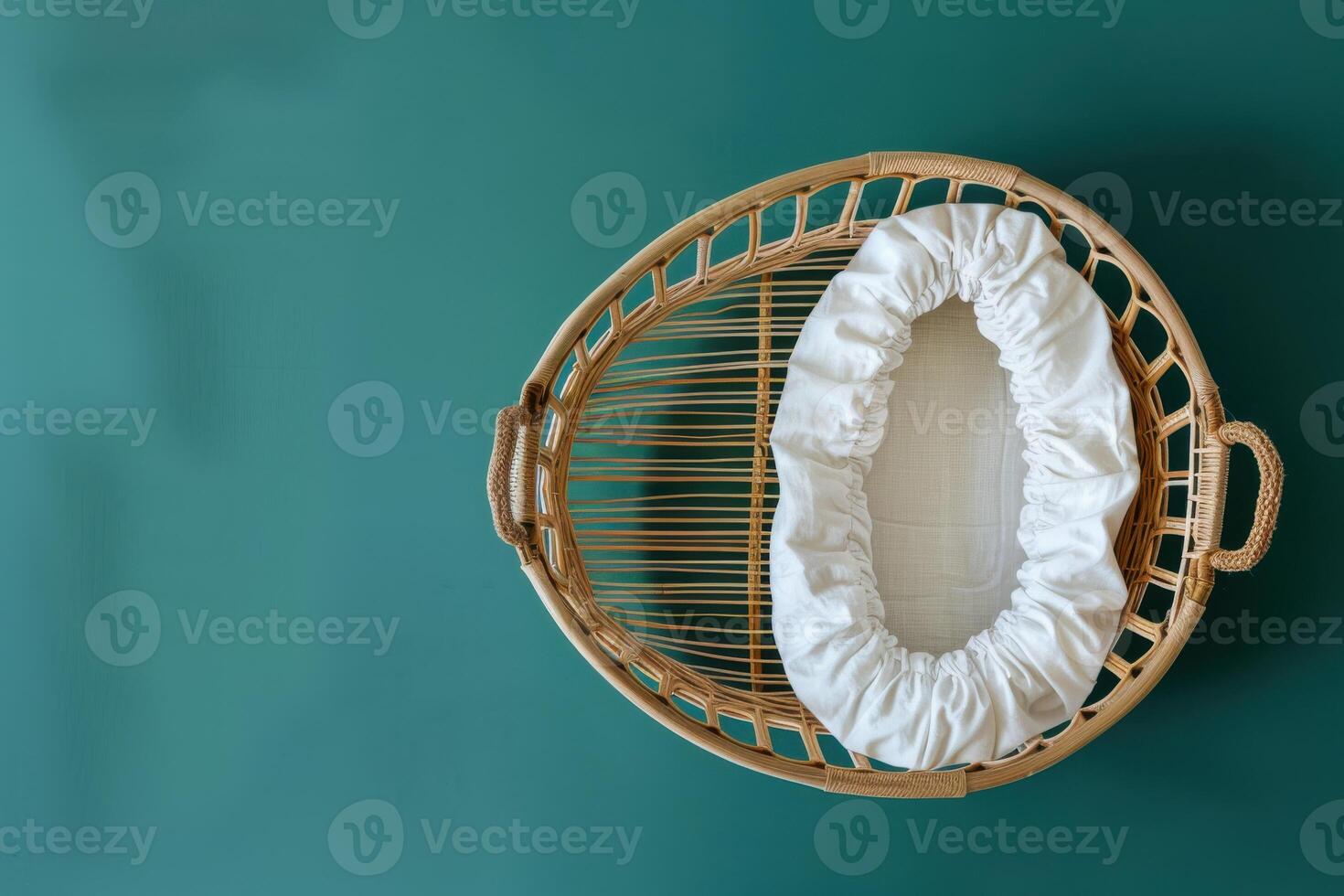 Stylish woven basket with a soft white liner set against a vibrant teal backdrop, perfect for nursery decor or cozy settings photo