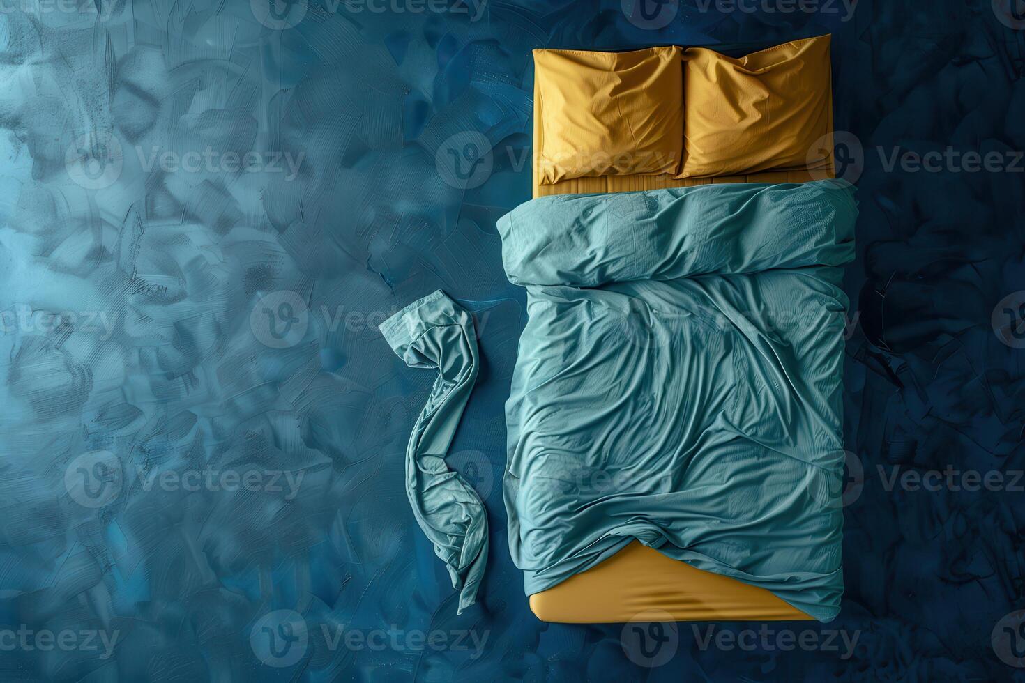 Cozy blue and yellow bedding arrangement on a serene background in a tranquil bedroom setting photo