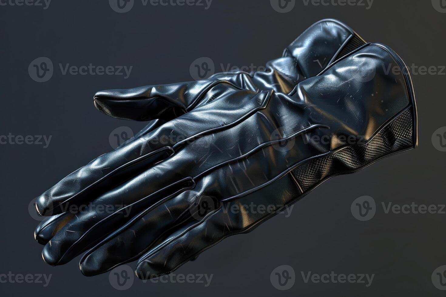 Black leather gloves placed on a dark background with a sleek design highlighting texture and craftsmanship photo