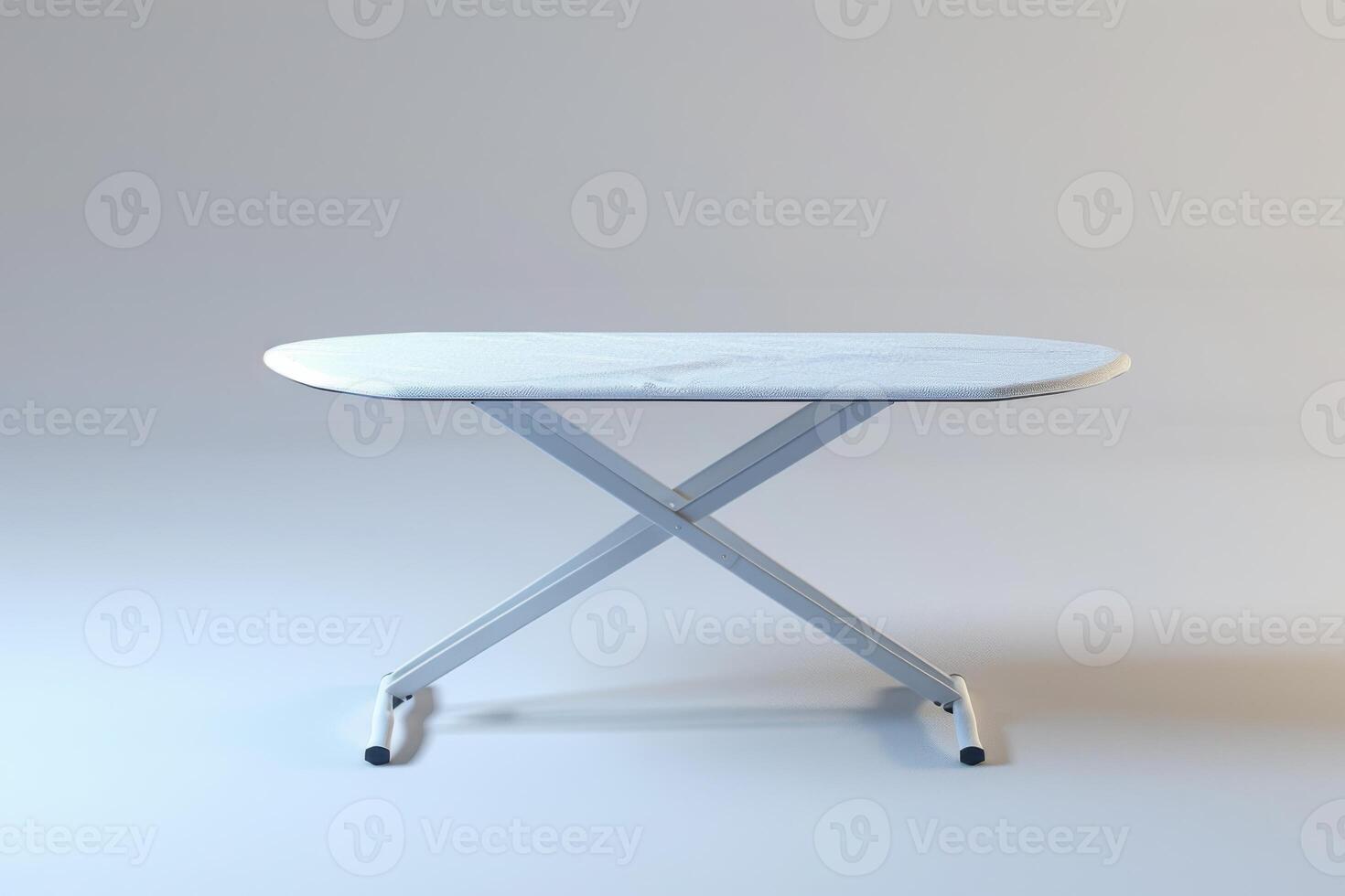 Simple white ironing board with metal frame in a minimalist setting photo
