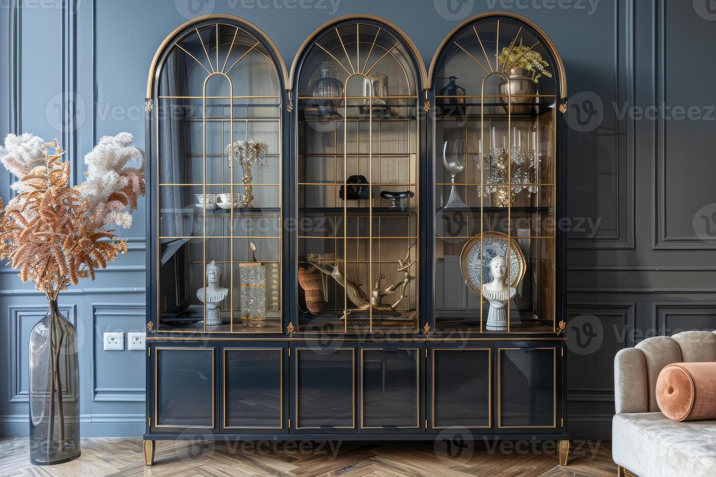 Elegant display cabinet with arches and decorative items in a modern living room photo