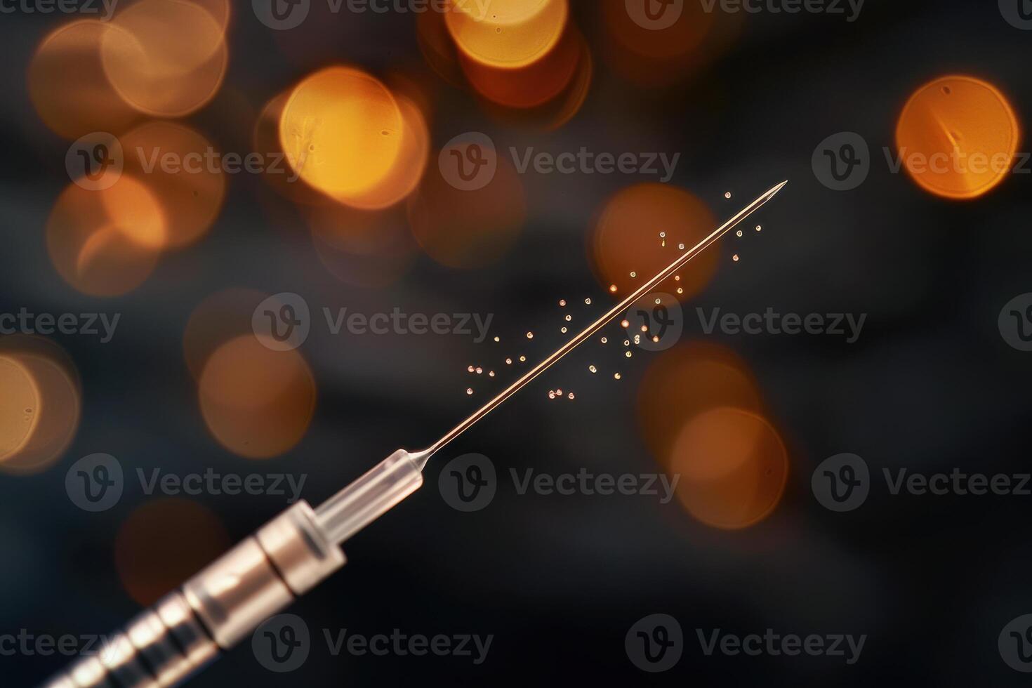 Close-up of a syringe needle with glowing bokeh lights in the background photo