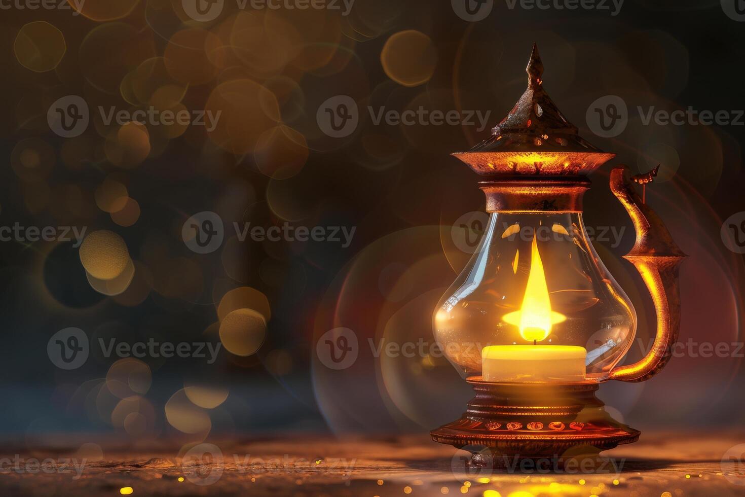 A warm candlelit lantern glowing softly against a dark background photo