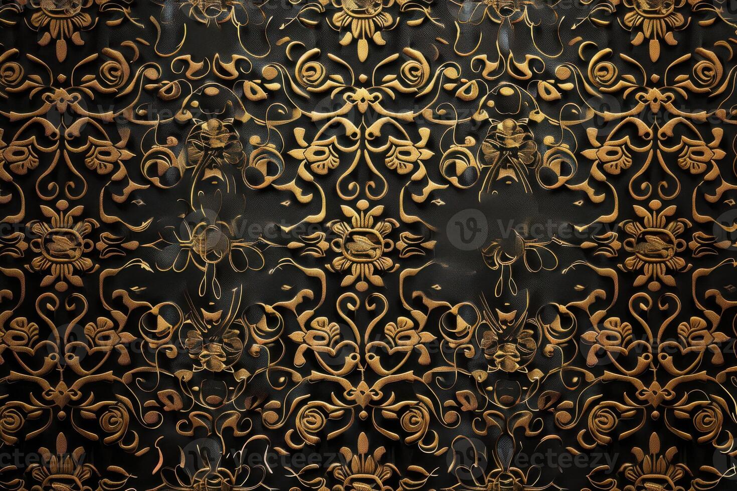 Ornate gold floral pattern on a dark background creating an elegant texture photo