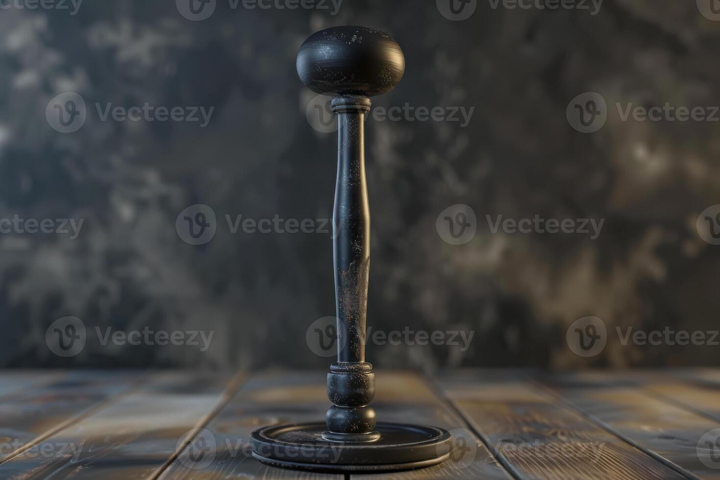 A vintage black wax seal stamp stands upright on a wooden table against a dark, textured background photo