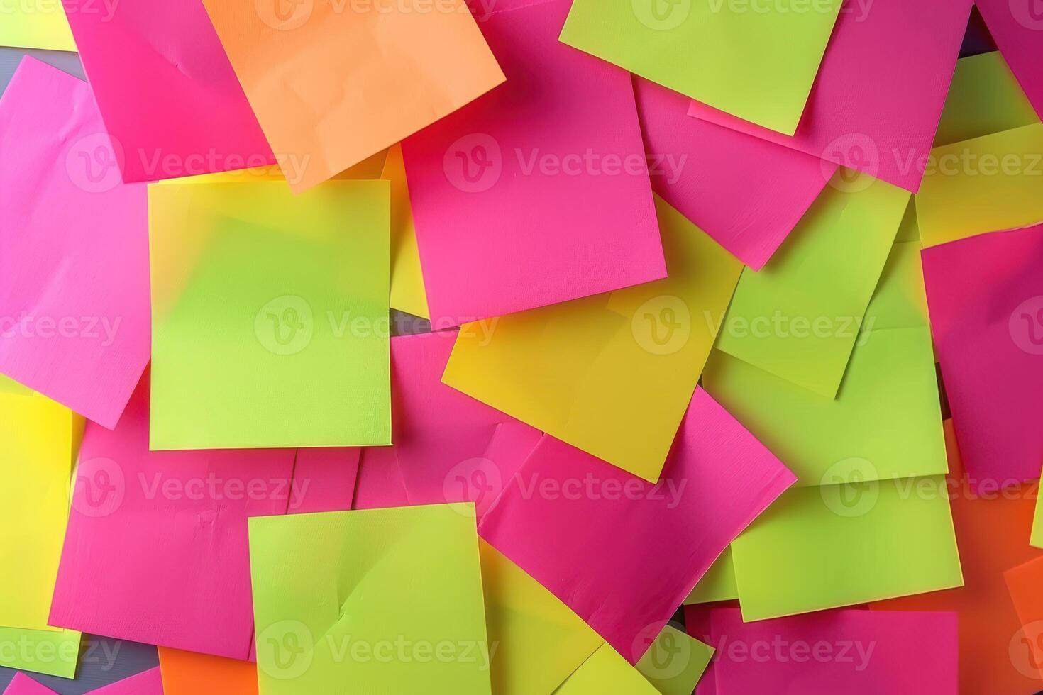 Colorful sticky notes scattered on a desk in a creative workspace photo