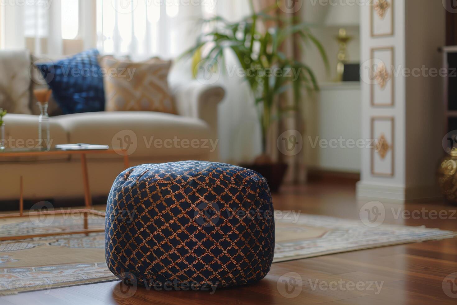 Cozy living room with a decorative pouf and warm natural light in the afternoon photo