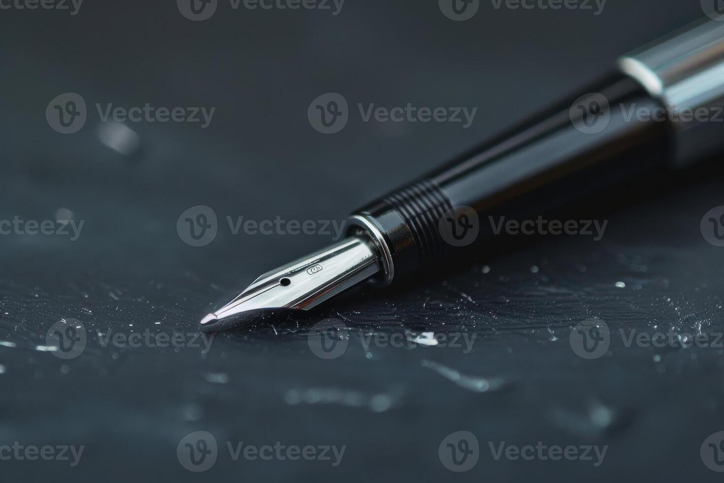Elegant fountain pen resting on a textured black surface, ready for writing in a quiet study environment photo