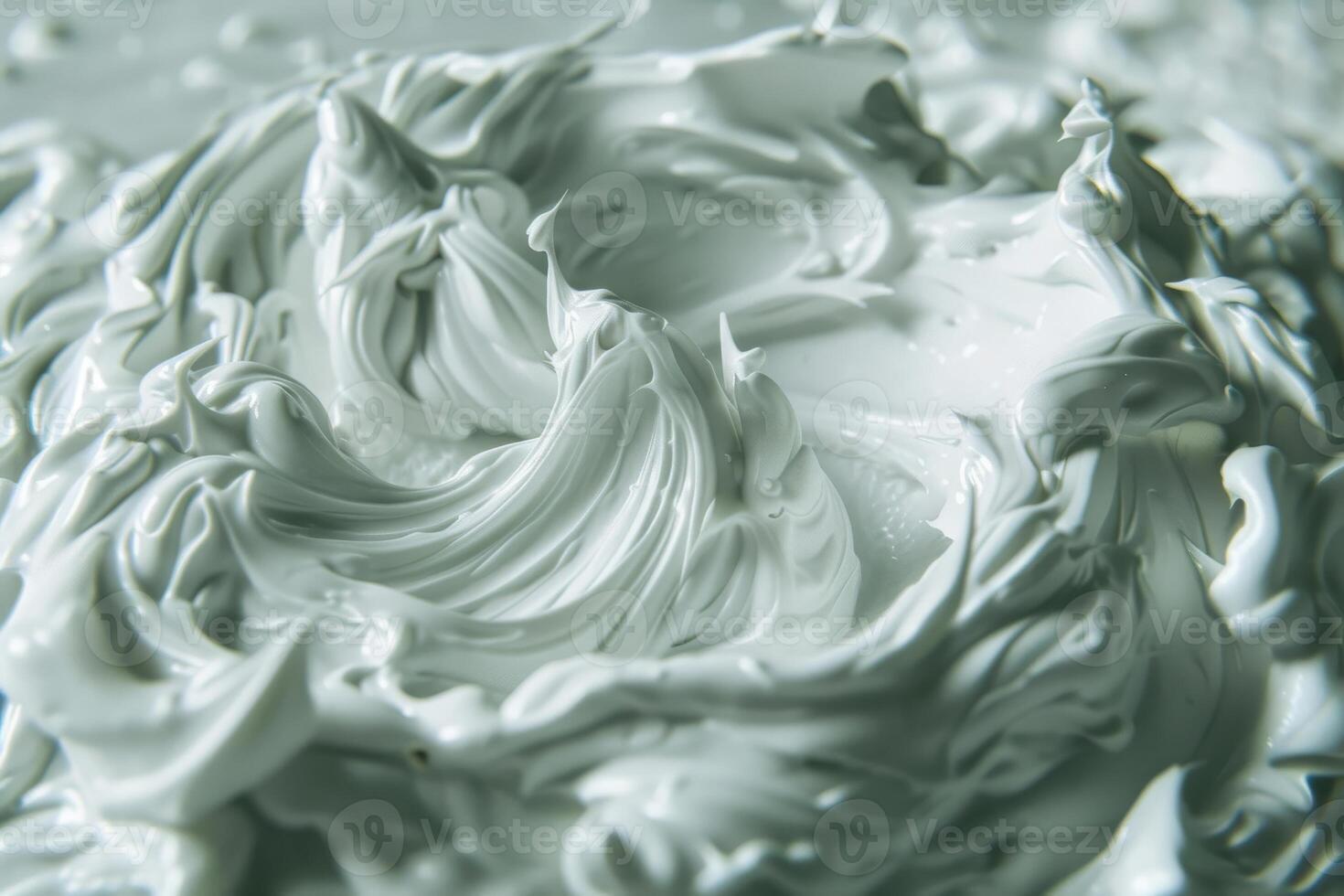 Creamy white texture swirling in a mixing bowl photo