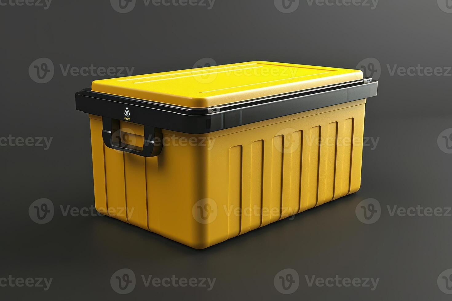 Yellow storage box with a black lid on a dark background photo