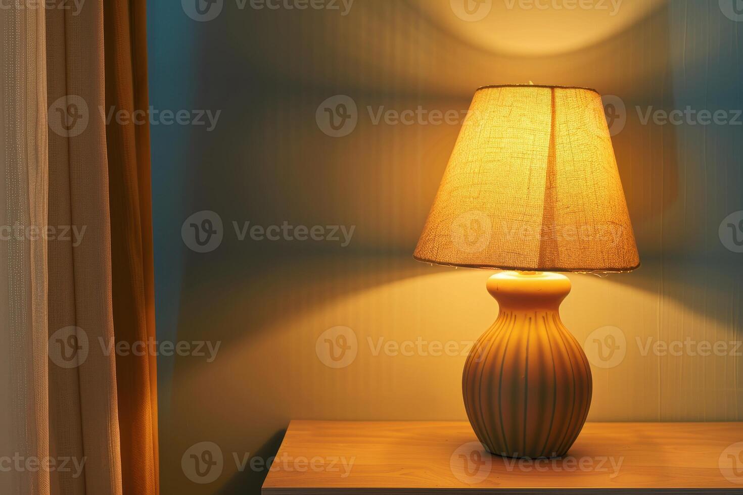 A cozy lamp illuminates a room corner in warm light during the evening photo