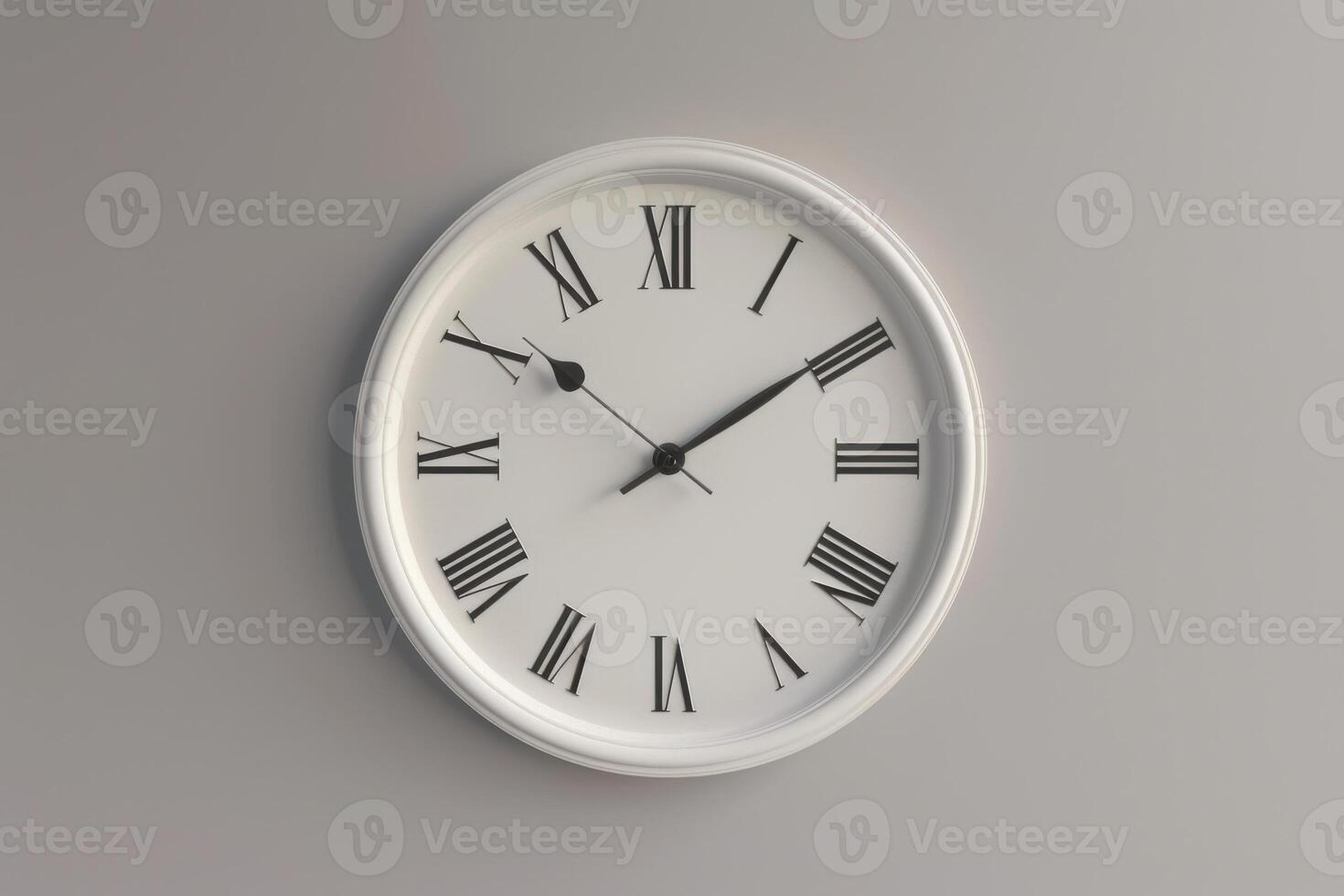 Wall clock with Roman numerals showing the time at three o'clock, mounted on a light grey wall photo
