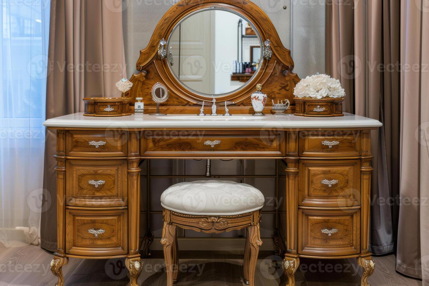 Elegant vintage wooden vanity with a round mirror and plush stool in a softly lit room photo