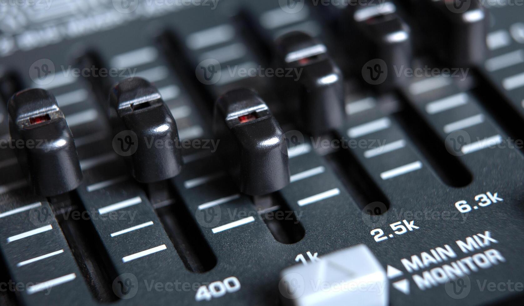 sound mixer and faders close up equalizer photo
