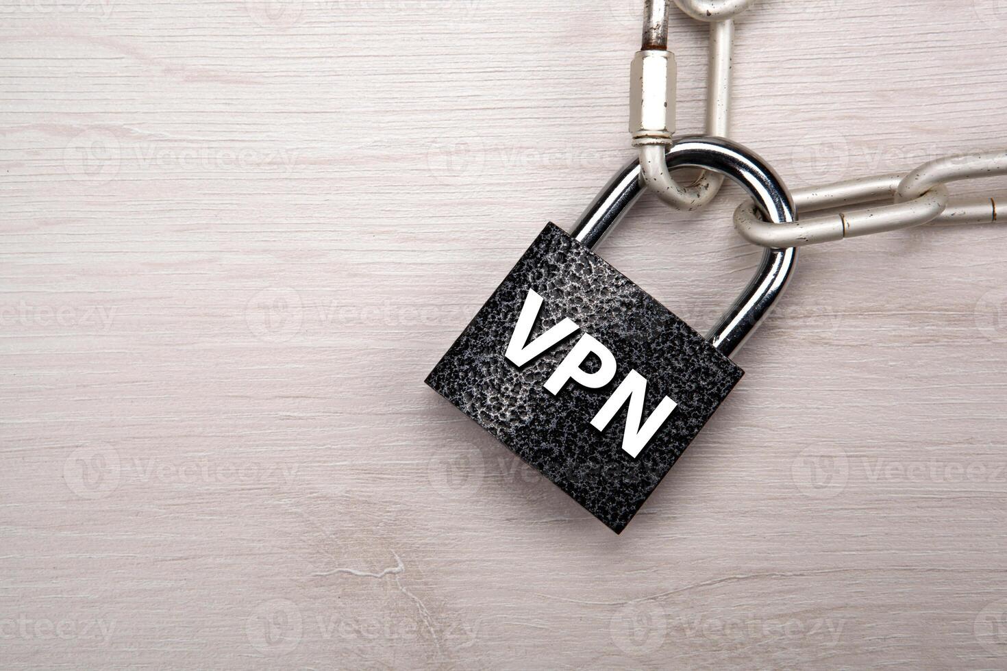 padlock with network VPN with a steel chain closeup top view photo