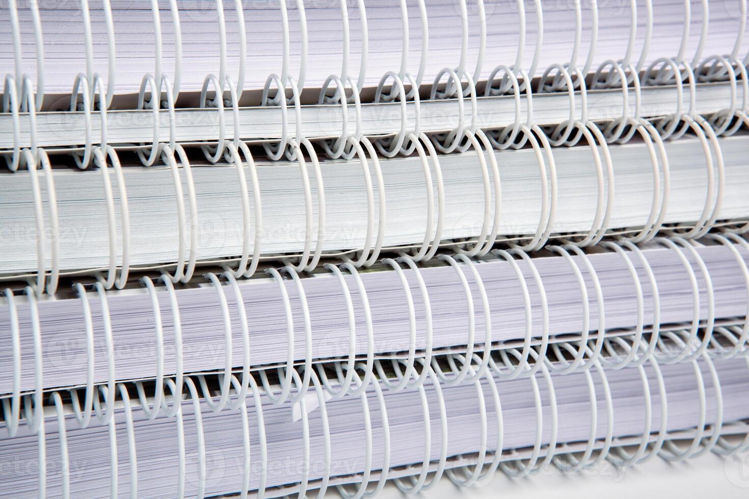 stack of large white notebooks as background concept photo