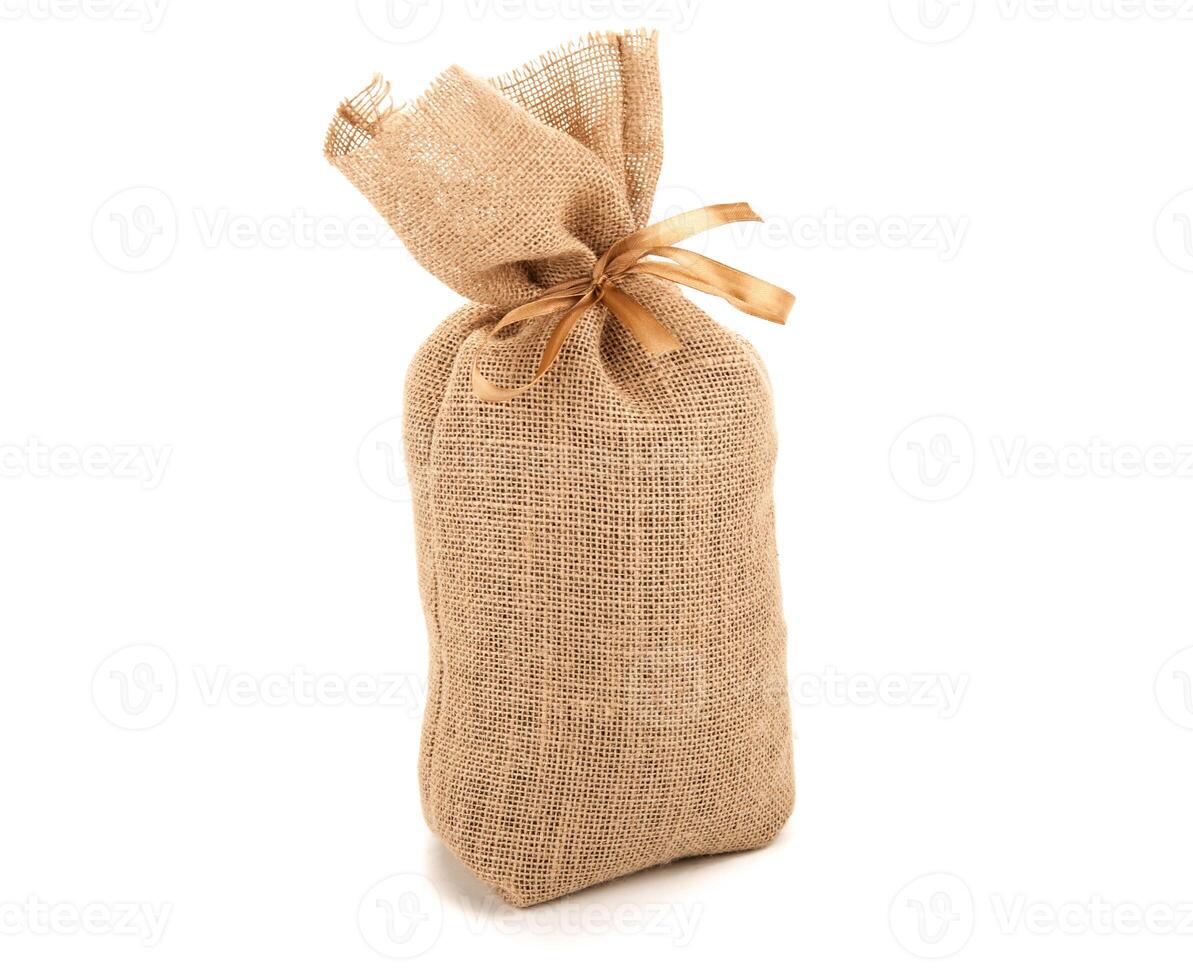 big bag of bow tied with a bow on a white background isolated photo