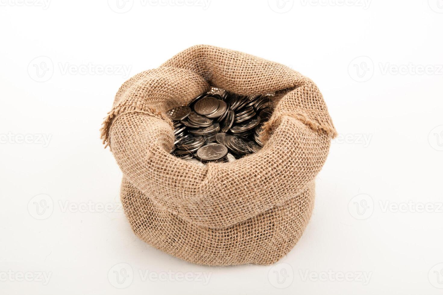 Russian ruble coins in a bag on a white background isolated photo