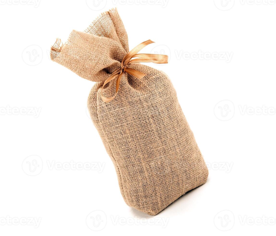 big bag of bow tied with a bow on a white background isolated photo