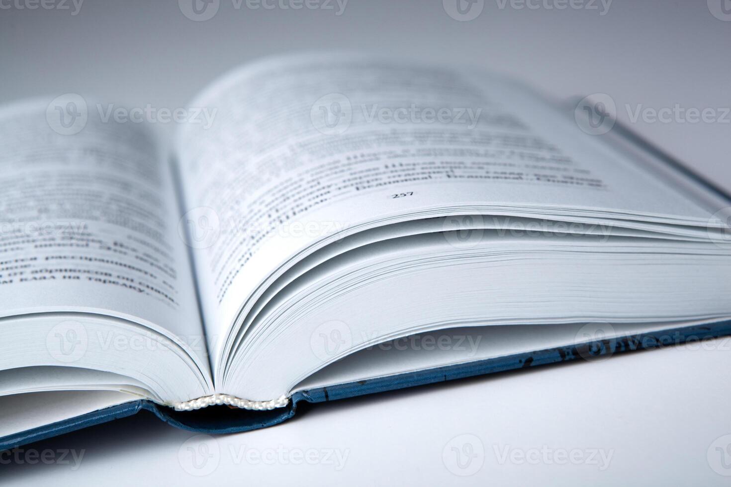 new open book with on a gray table photo