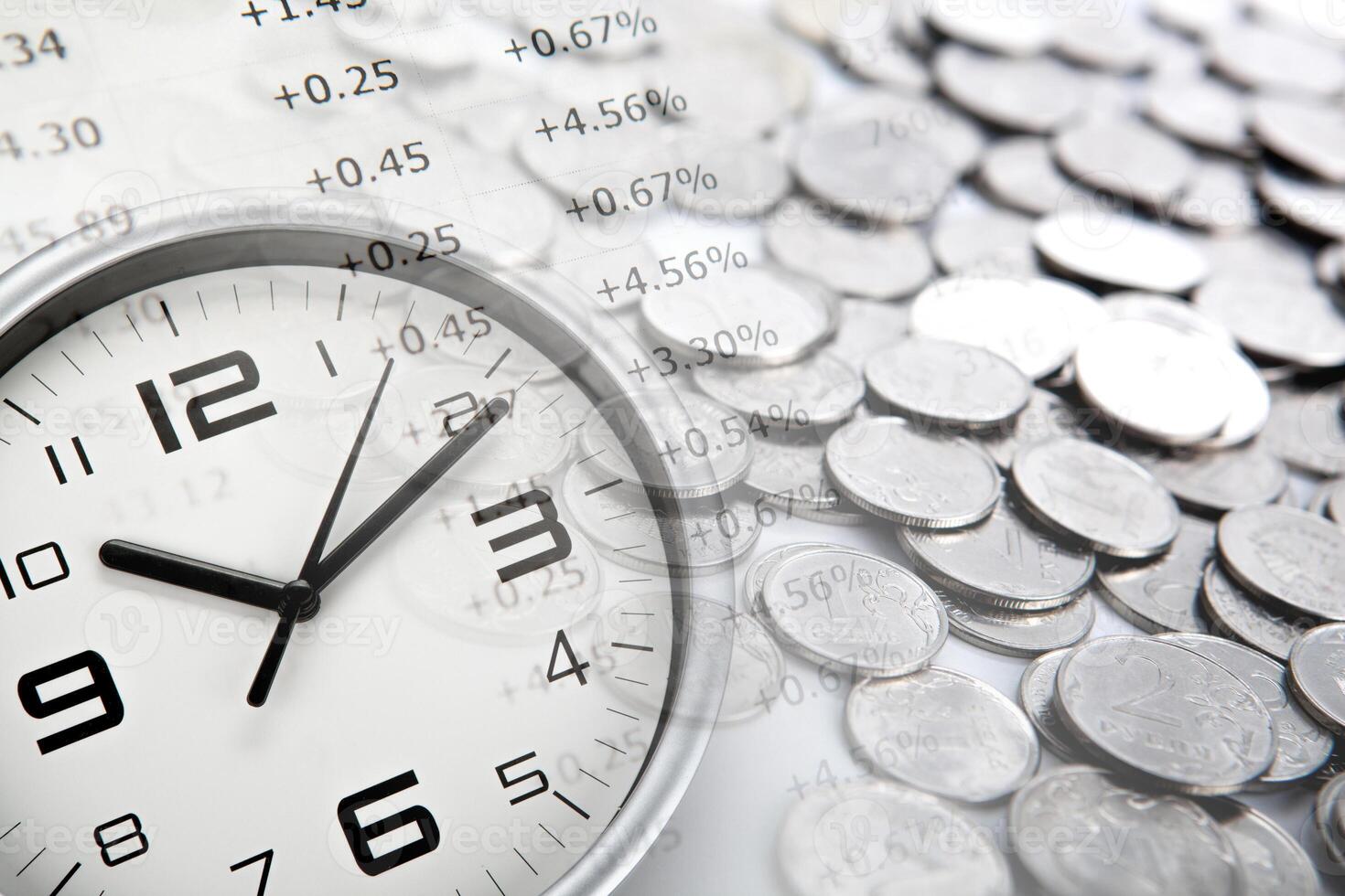 white clock face and Russian ruble coins and digits photo